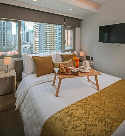 Imagen de la habitación del Hotel The Mini Suites - Eton Tower Makati. Foto 33