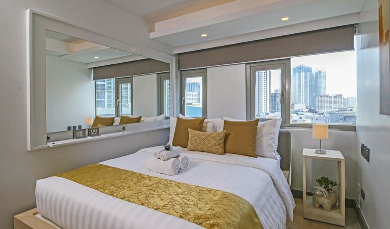 Imagen de la habitación del Hotel The Mini Suites - Eton Tower Makati. Foto 35