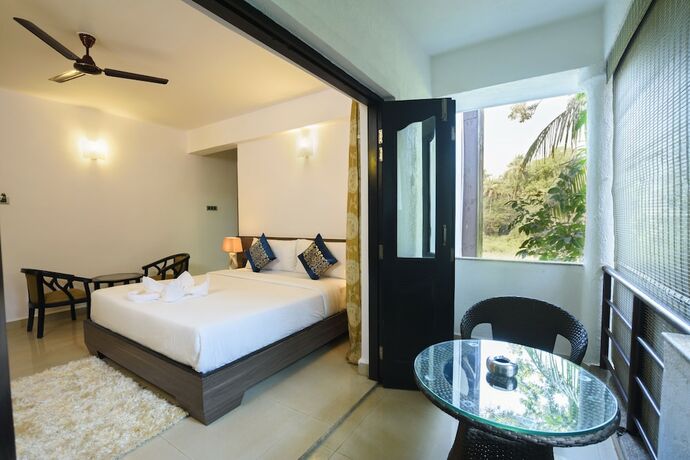 Imagen de la habitación del Hotel The Mint Goa. Foto 15