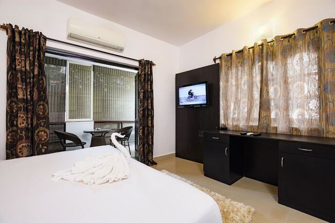 Imagen de la habitación del Hotel The Mint Goa. Foto 18