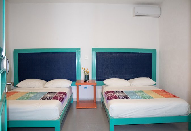 Imagen de la habitación del Hotel The Mint Resort Isla Mujeres. Foto 3