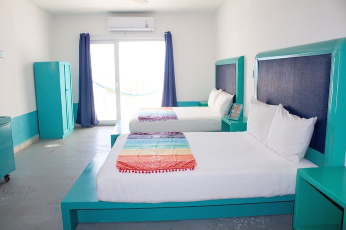 Imagen de la habitación del Hotel The Mint Resort Isla Mujeres. Foto 5