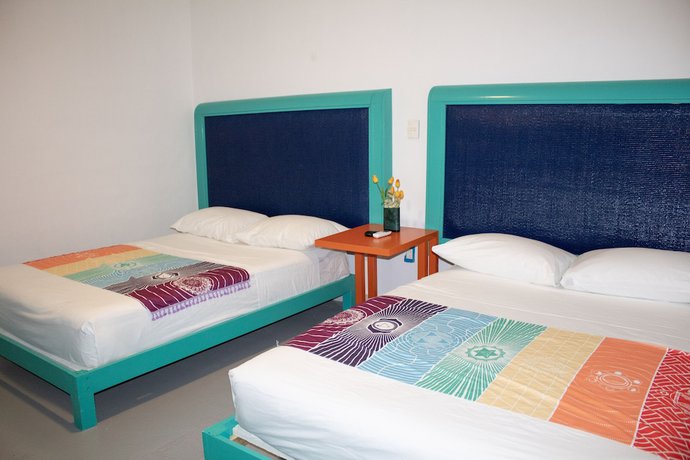 Imagen de la habitación del Hotel The Mint Resort Isla Mujeres. Foto 9
