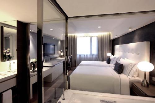 Imagen de la habitación del Hotel The Mira Hong Kong. Foto 12