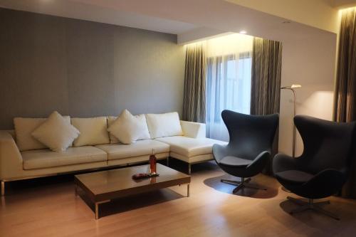 Imagen de la habitación del Hotel The Mira Hong Kong. Foto 13