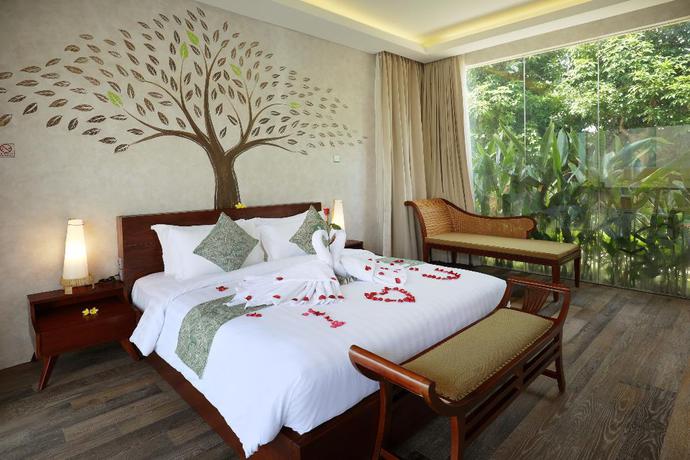 Imagen de la habitación del Hotel The Miracle Nusa Dua. Foto 12