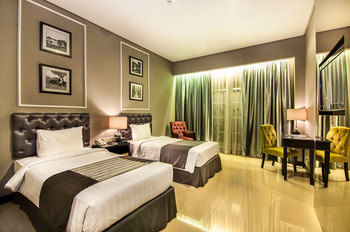 Imagen de la habitación del Hotel The Mirah Bogor. Foto 9