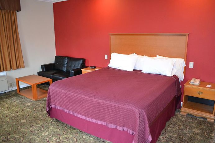 Imagen de la habitación del Hotel The Miramar Inn and Suites. Foto 10