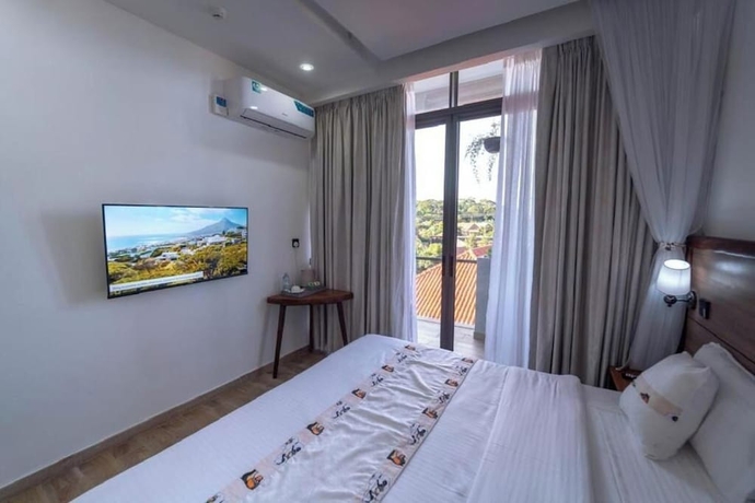 Imagen de la habitación del Hotel The Mist Entebbe. Foto 5