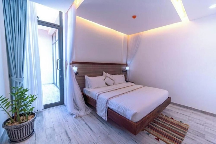 Imagen de la habitación del Hotel The Mist Entebbe. Foto 14