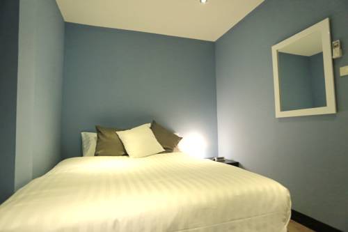 Imagen de la habitación del Hotel The Mix Bangkok - Silom. Foto 6