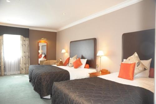 Imagen de la habitación del Hotel The Moat House. Foto 9