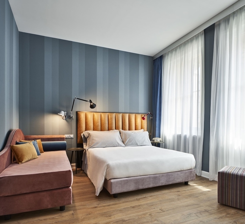 Imagen de la habitación del Hotel The Modernist, Trieste. Foto 4