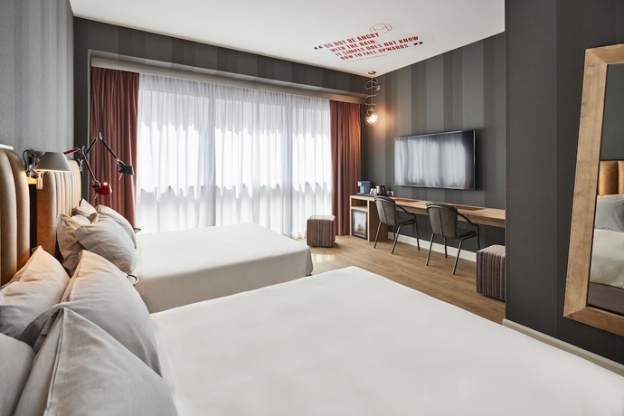 Imagen de la habitación del Hotel The Modernist, Trieste. Foto 10