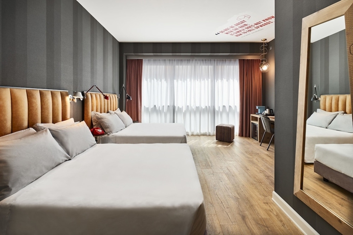 Imagen de la habitación del Hotel The Modernist, Trieste. Foto 11