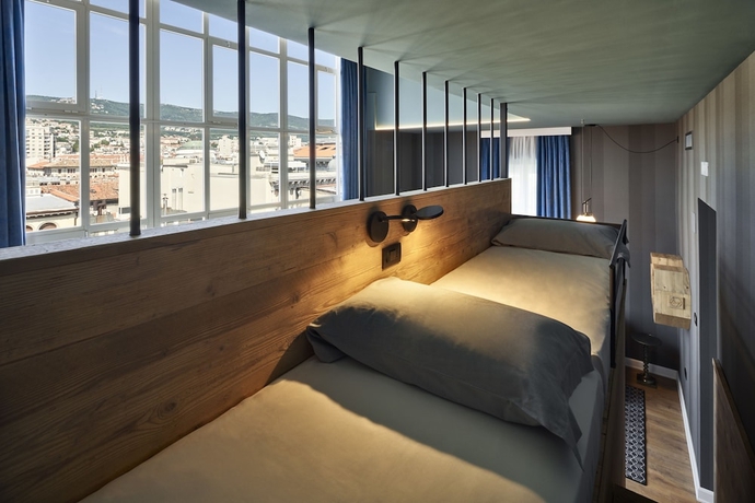 Imagen de la habitación del Hotel The Modernist, Trieste. Foto 16