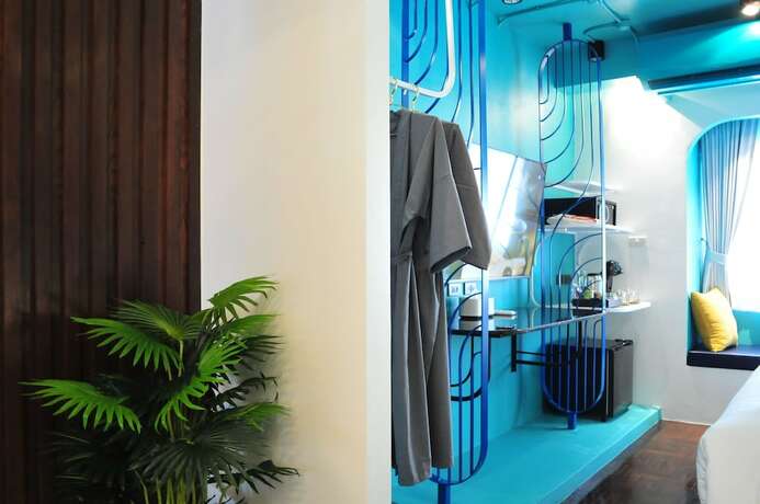 Imagen de la habitación del Hotel The Moment Chiangmai. Foto 13