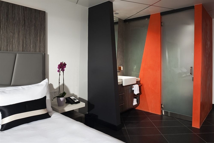 Imagen de la habitación del Hotel The Moment. Foto 3