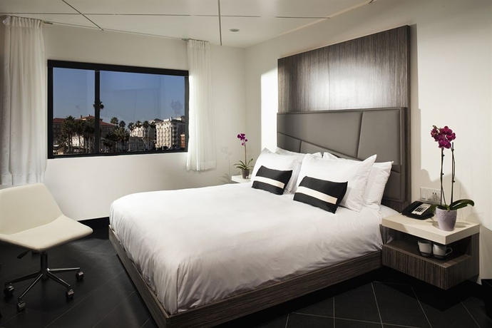 Imagen de la habitación del Hotel The Moment. Foto 9