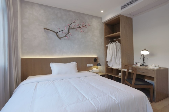 Imagen de la habitación del Hotel The Moment We Met. Foto 2