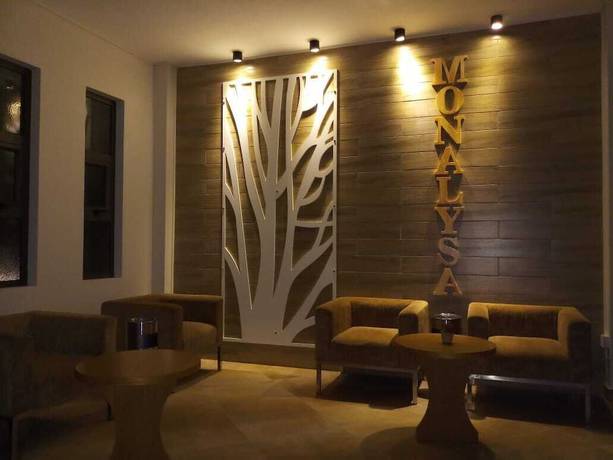 Imagen del bar/restaurante del Hotel The Monalysa Suites and Residence. Foto 4
