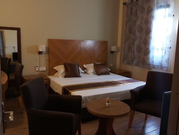 Imagen de la habitación del Hotel The Monalysa Suites and Residence. Foto 10