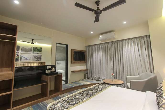 Imagen de la habitación del Hotel The Monarch Turbhe. Foto 18