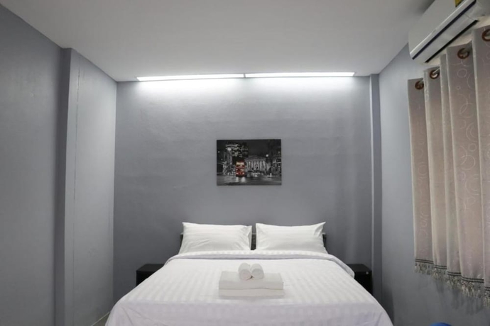 Imagen de la habitación del Hotel The Money inn. Foto 8