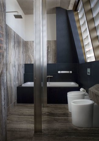 Imagen de la habitación del Hotel The Monopol. Foto 11