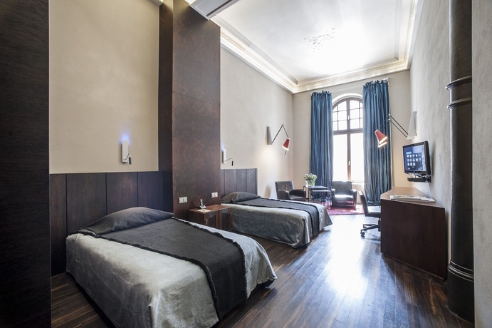 Imagen de la habitación del Hotel The Monopol. Foto 13