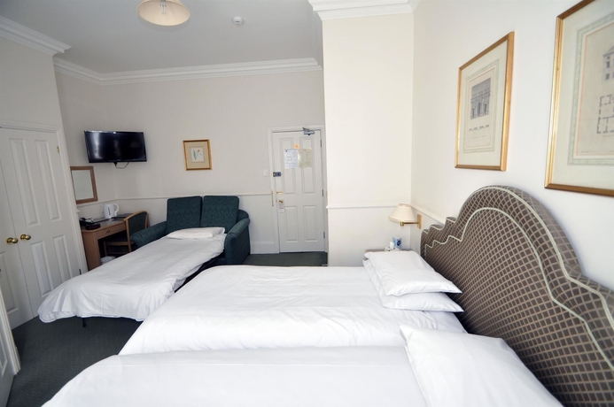 Imagen de la habitación del Hotel The Montague. Foto 6