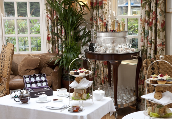 Imagen del bar/restaurante del Hotel The Montague On The Gardens. Foto 8