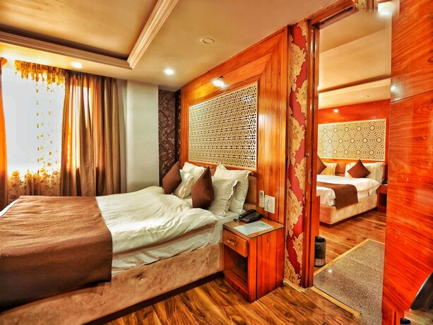 Imagen de la habitación del Hotel The Montreal Near by Dal Lake. Foto 12