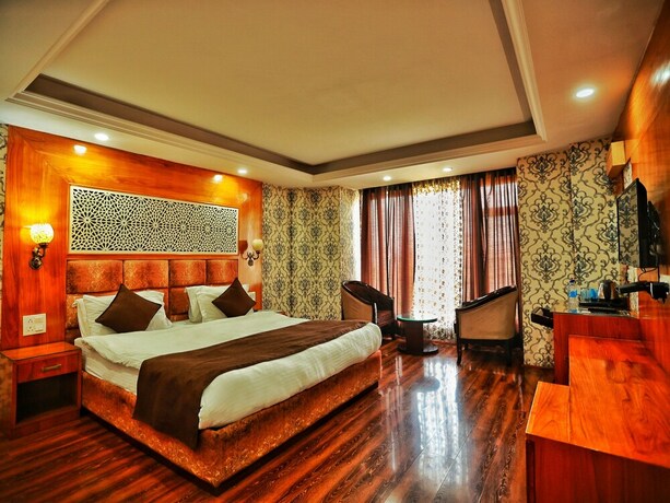 Imagen de la habitación del Hotel The Montreal Near by Dal Lake. Foto 18