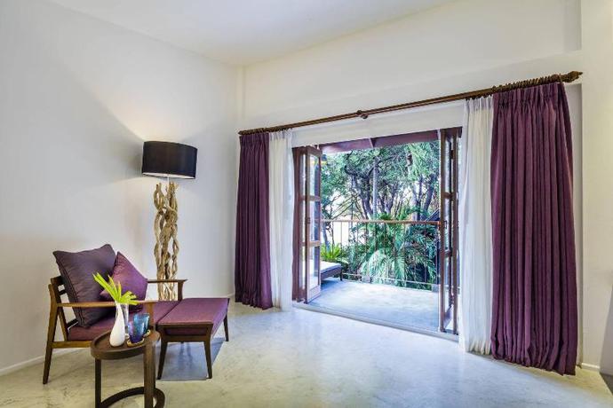Imagen de la habitación del Hotel The Monttra Pattaya. Foto 5