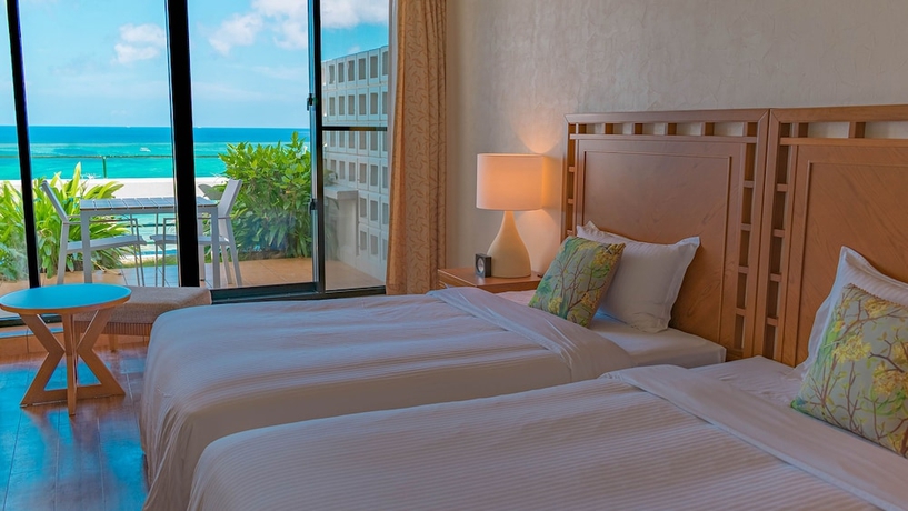 Imagen de la habitación del Hotel The Moon Beach Museum Resort. Foto 4