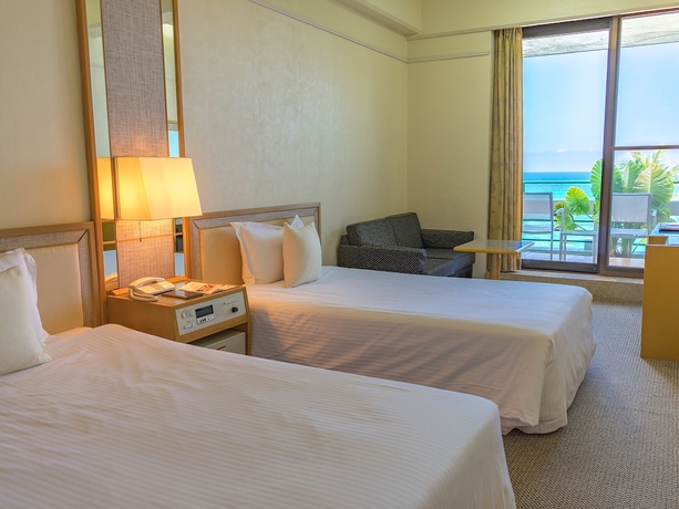 Imagen de la habitación del Hotel The Moon Beach Museum Resort. Foto 9