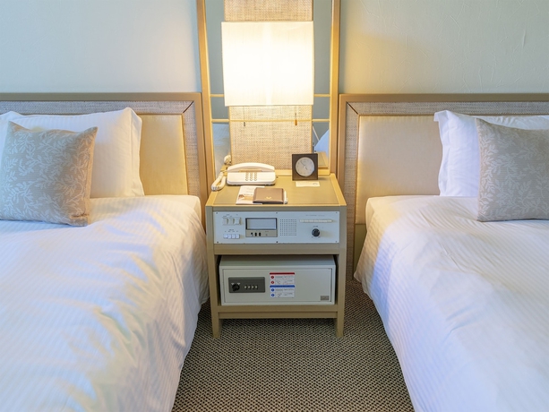 Imagen de la habitación del Hotel The Moon Beach Museum Resort. Foto 11