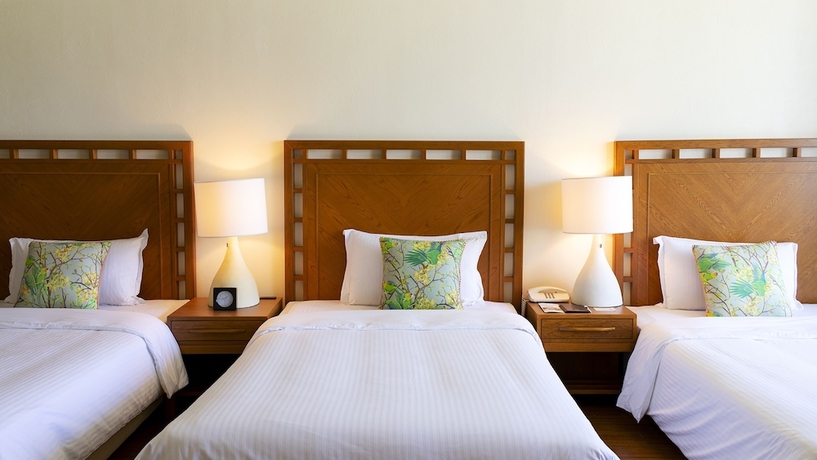 Imagen de la habitación del Hotel The Moon Beach Museum Resort. Foto 16