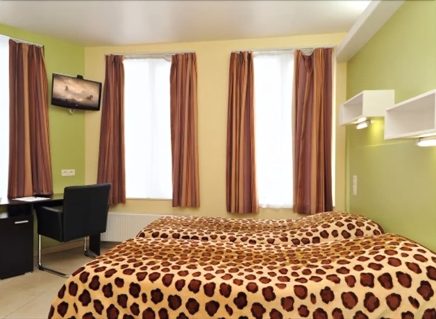 Imagen de la habitación del Hotel The Moon, Bruselas. Foto 4