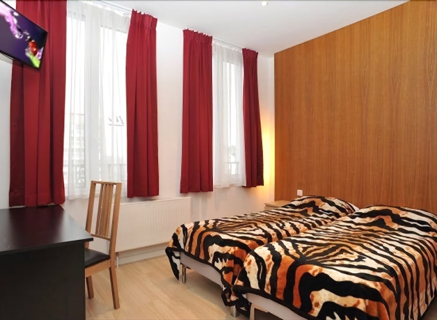 Imagen de la habitación del Hotel The Moon, Bruselas. Foto 9