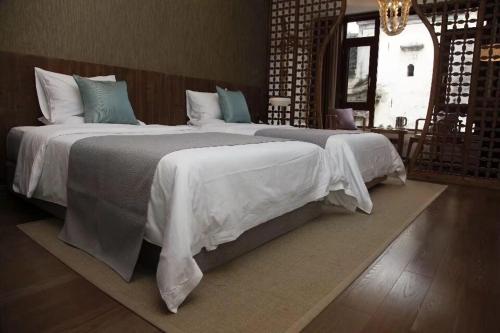 Imagen de la habitación del Hotel The Moon House. Foto 5