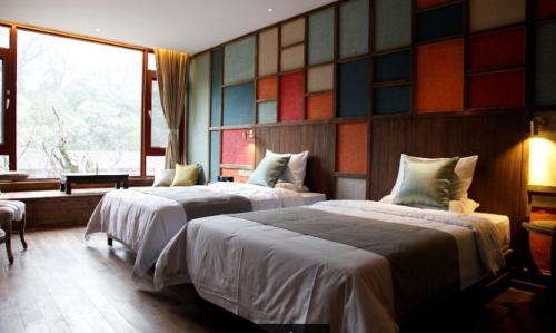 Imagen de la habitación del Hotel The Moon House. Foto 7