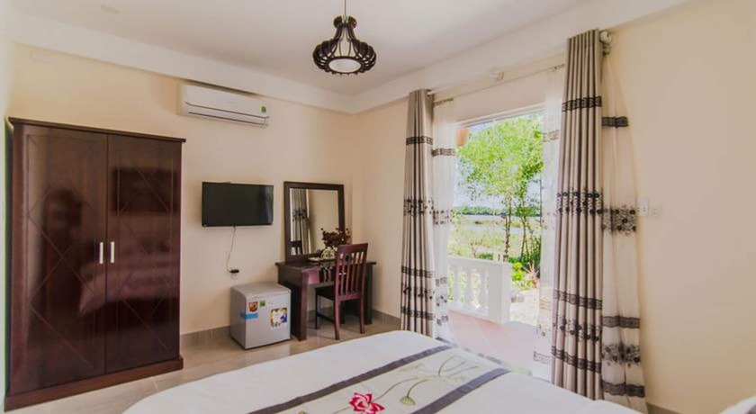 Imagen de la habitación del Hotel The Moon River Homestay and Villa. Foto 7