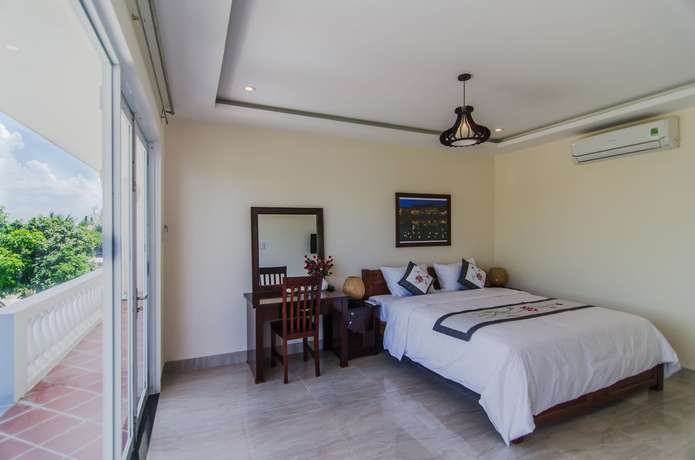 Imagen de la habitación del Hotel The Moon River Homestay and Villa. Foto 13