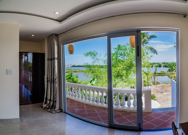 Imagen de la habitación del Hotel The Moon River Homestay and Villa. Foto 15