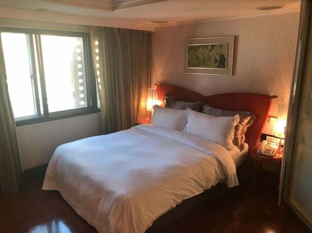 Imagen de la habitación del Hotel The Moon, Taipei. Foto 18