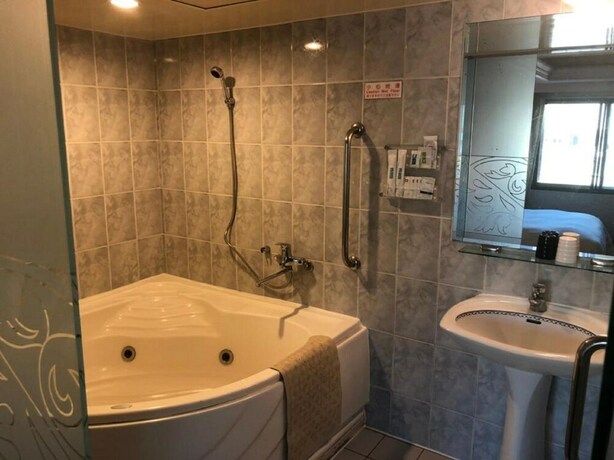 Imagen de la habitación del Hotel The Moon, Taipei. Foto 20