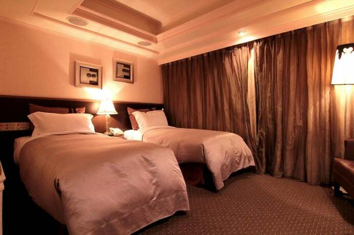 Imagen de la habitación del Hotel The Moon, Taipei. Foto 23