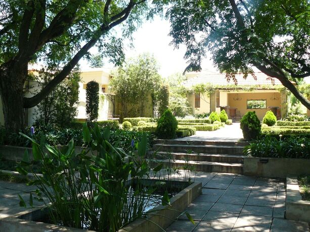 Imagen de la habitación del Hotel The Moon and Sixpence Garden Guest House. Foto 19